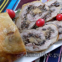 М’ясний рулет з грибами у курячій шкірці 